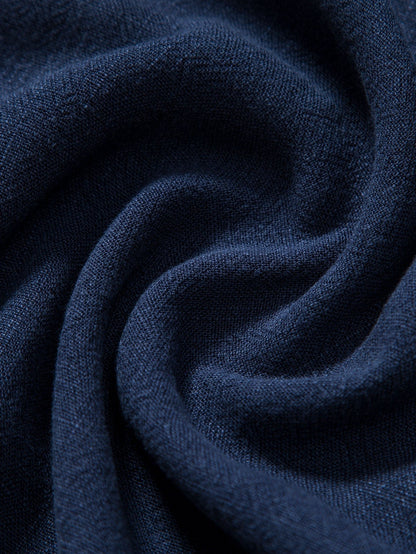 Close-up of dark blue fabric with visible texture