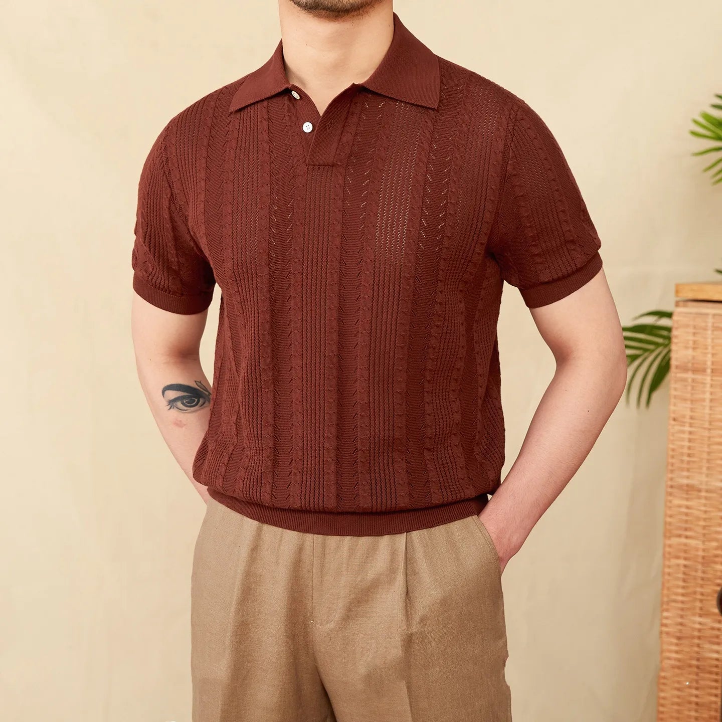 Premium Men's rust brown textured polo showcasing an intricate pointelle knit and a tailored, breathable fit.