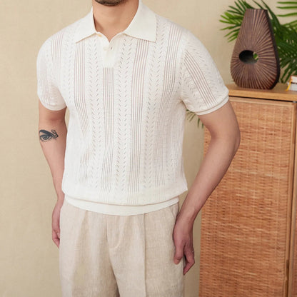 Men's white Pointelle knit polo featuring a sophisticated geometric open-stitch pattern and a classic buttoned neckline.