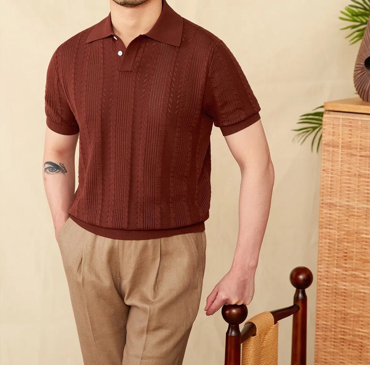 Premium Men's rust brown textured polo showcasing an intricate pointelle knit and a tailored, breathable fit.