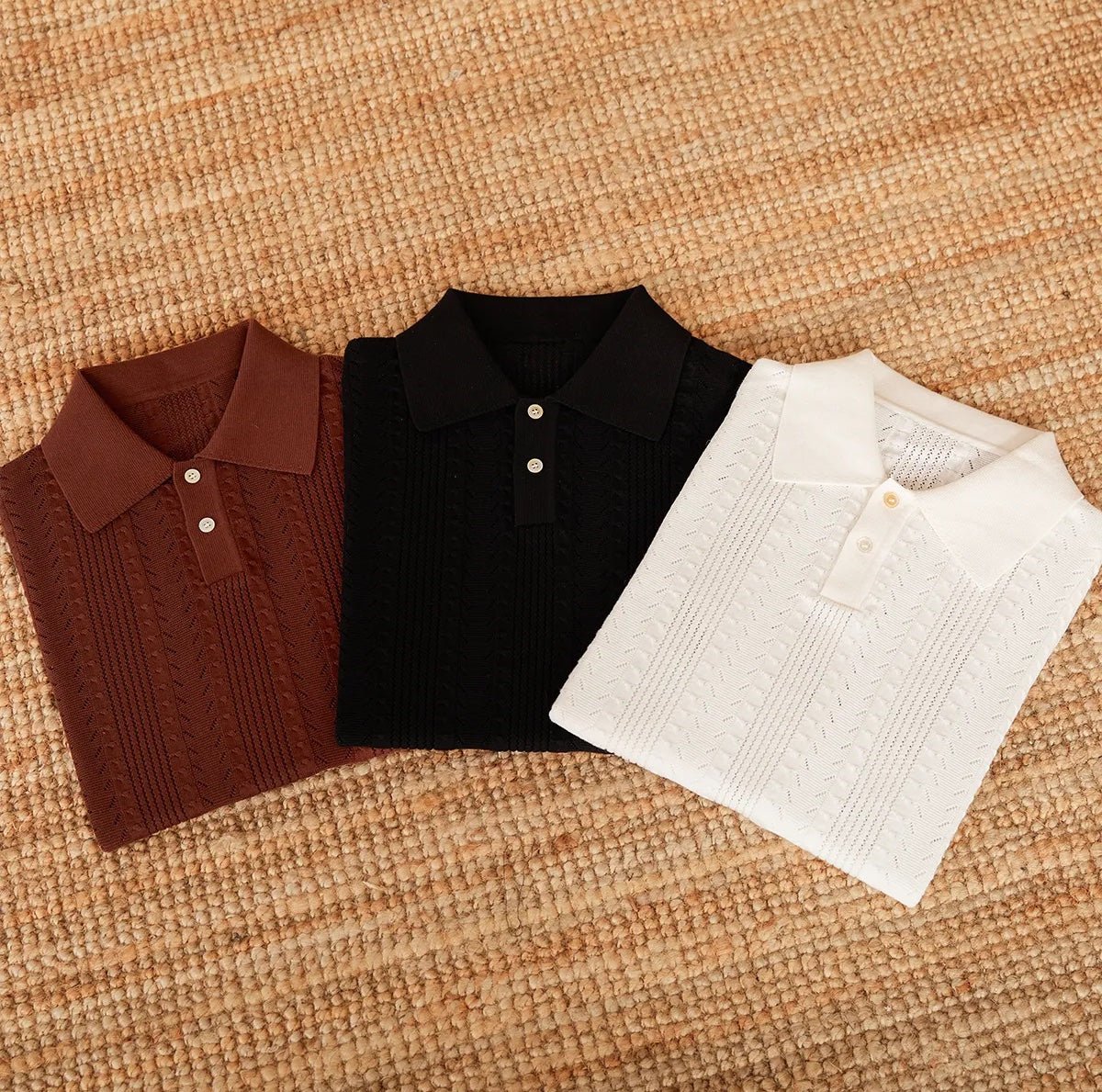 Men's white Pointelle knit polo featuring a sophisticated geometric open-stitch pattern and a classic buttoned neckline.