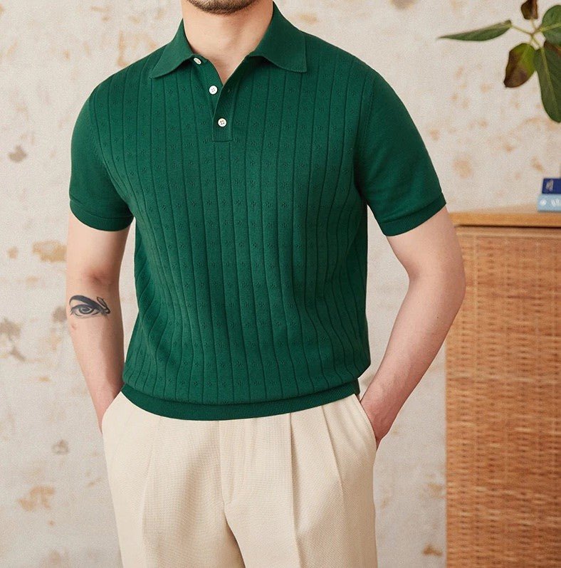Men's forest green 100% cotton polo featuring an intricate pointelle vertical ribbed texture and a refined buttoned placket.
