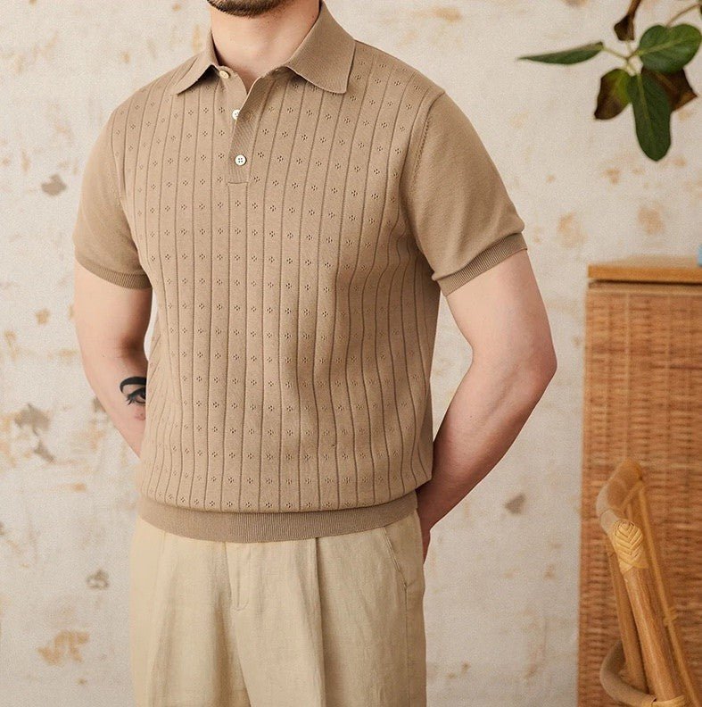 Men's warm camel-toned 100% cotton polo with a classic buttoned neckline and an architectural vertical ribbed pattern.