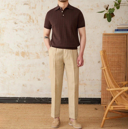 Men's deep chocolate brown textured cotton polo showcasing a sophisticated linear pointelle knit and a tailored silhouette.