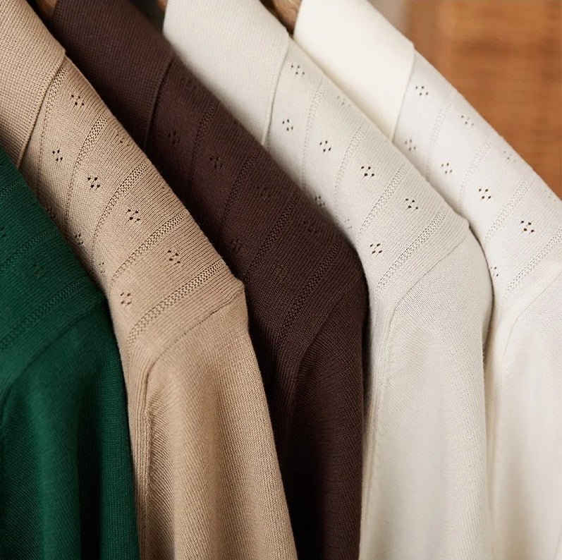 Men's warm camel-toned 100% cotton polo with a classic buttoned neckline and an architectural vertical ribbed pattern.