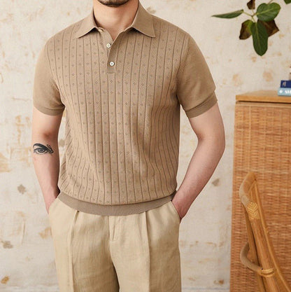 Men's warm camel-toned 100% cotton polo with a classic buttoned neckline and an architectural vertical ribbed pattern.