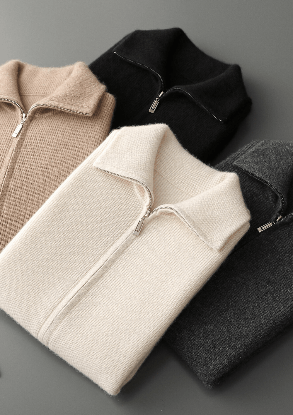 Men’s ivory cashmere zip-up vest featuring a clean, minimalist silhouette and a structured mock-neck collar for a sophisticated layered look.