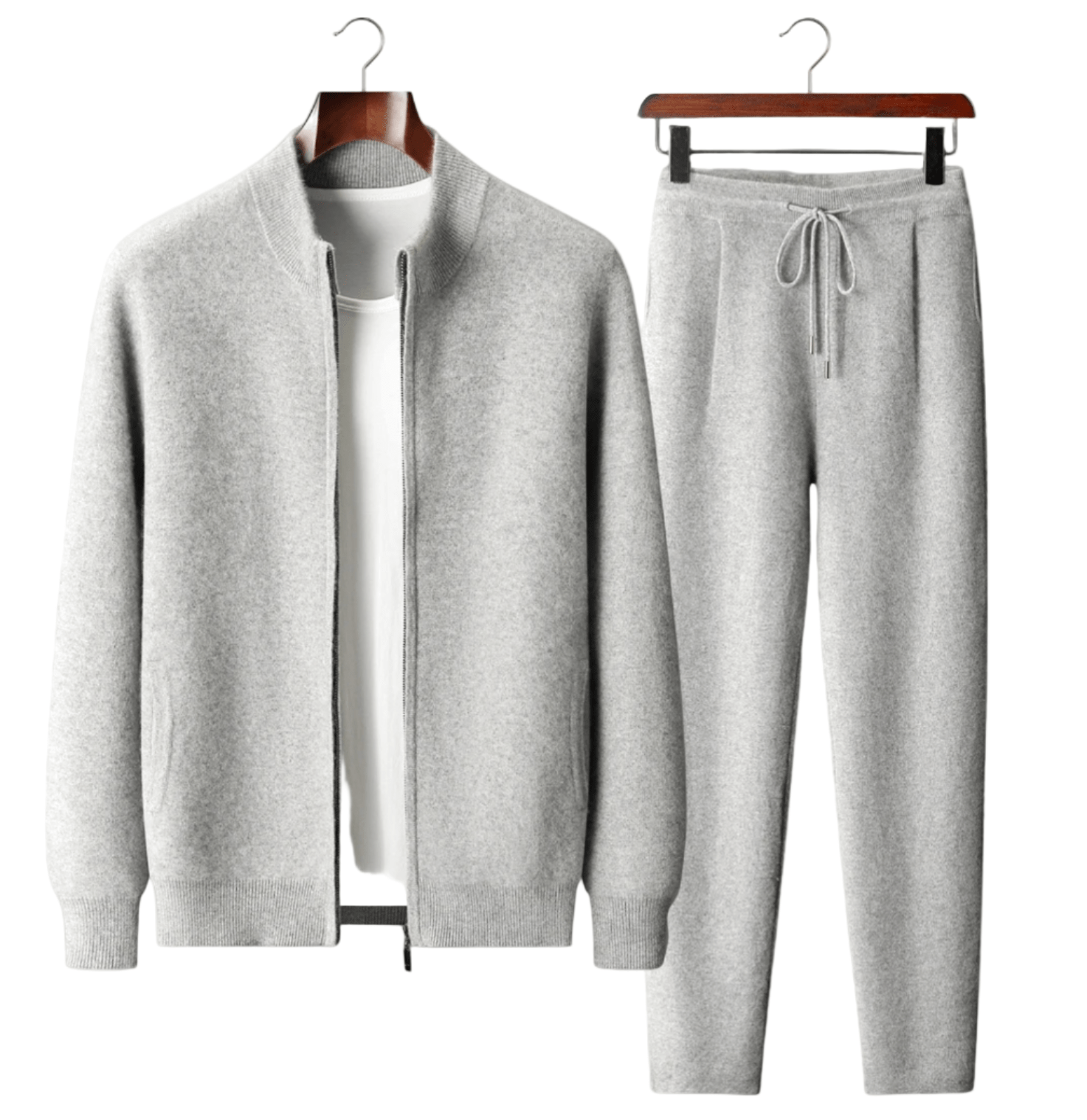 Gray tracksuit on hangers against a white background