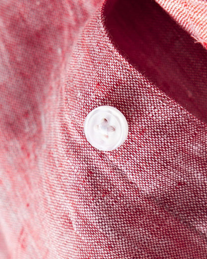 Close-up of the LORMIER fine linen weave in vibrant pink, highlighting the natural texture and high-quality construction.