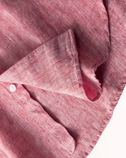 Close-up of the LORMIER fine linen weave in vibrant pink, highlighting the natural texture and high-quality construction.