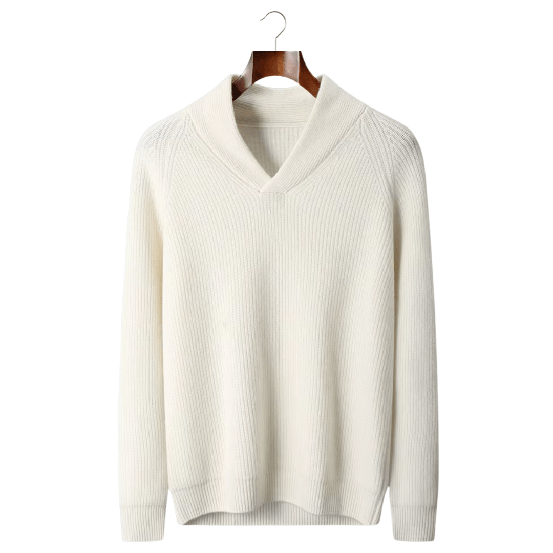White sweater on a wooden hanger against a white background
