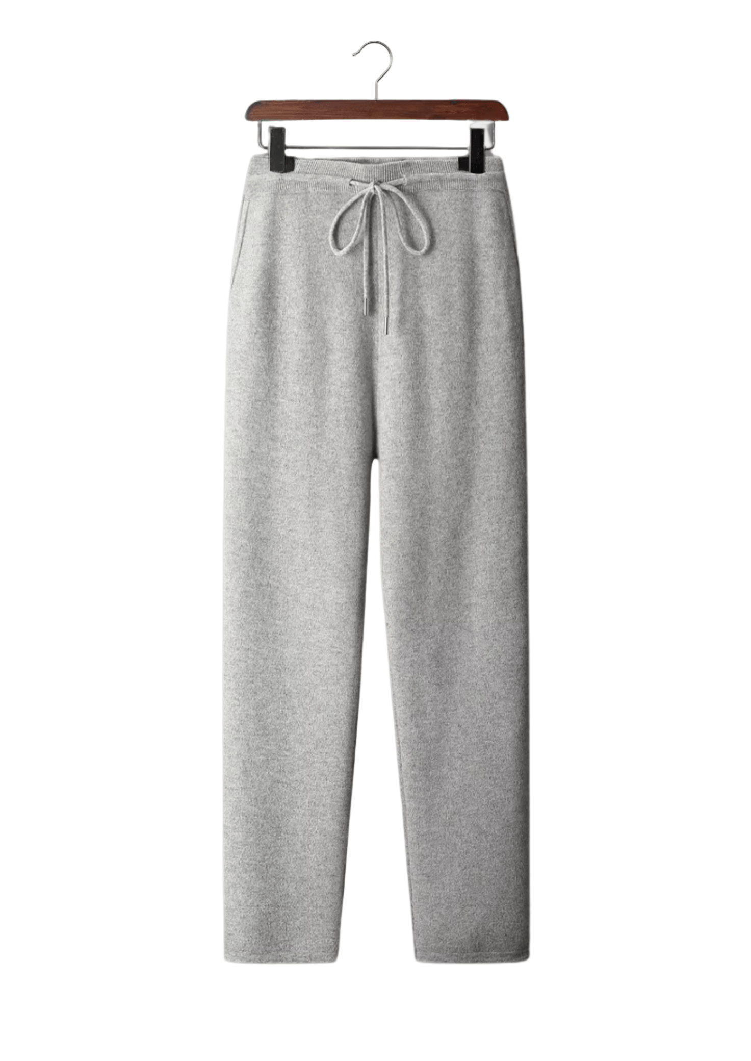 Gray sweatpants on a hanger against a white background