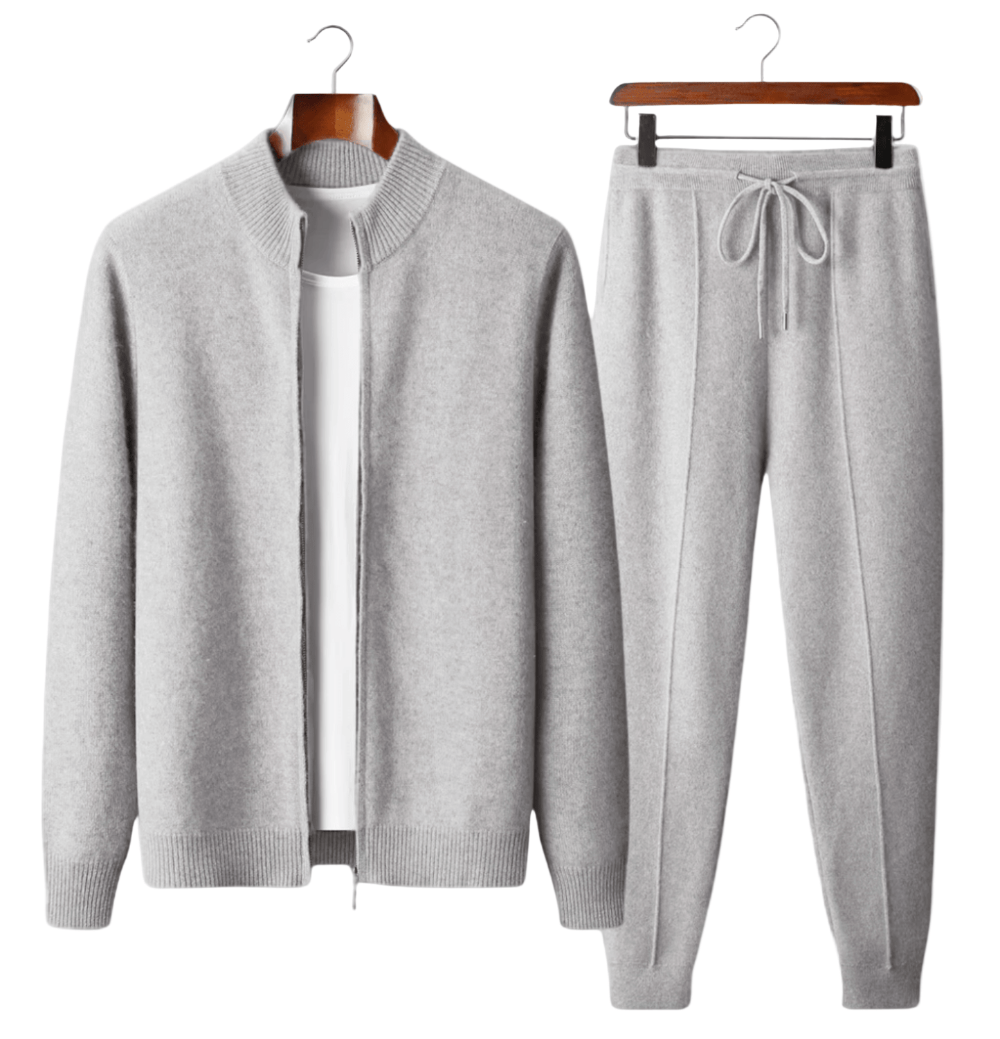 Gray sweater and jogger pants set on hangers against a white background
