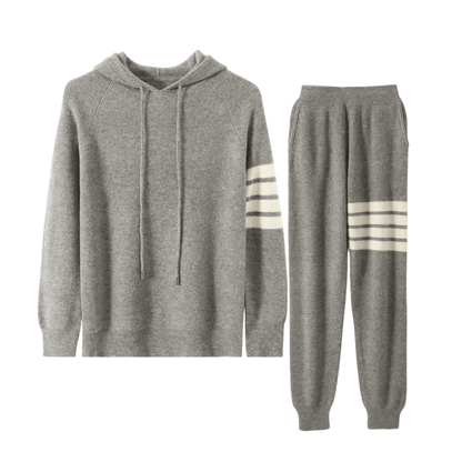 Men’s heather gray Merino wool tracksuit featuring a pullover hoodie and joggers with signature white stripes on the sleeve and thigh.