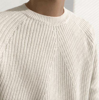 Clean white minimalist ribbed crew neck featuring ergonomic raglan sleeves and a premium matte finish.