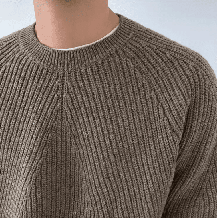 Men's brown relaxed-fit ribbed sweater featuring raglan sleeves and a 100% cotton knit construction.