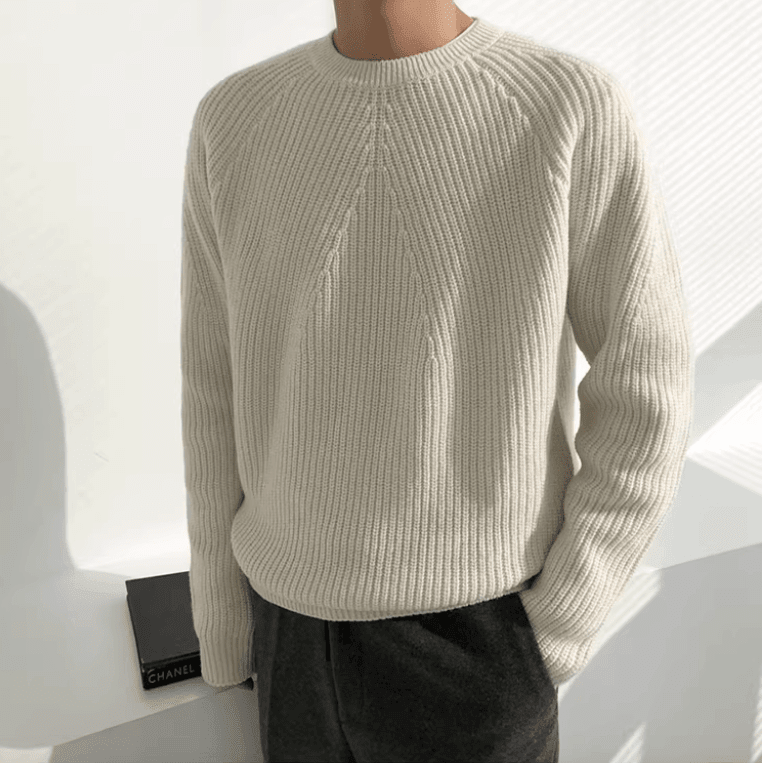 Clean white minimalist ribbed crew neck featuring ergonomic raglan sleeves and a premium matte finish.