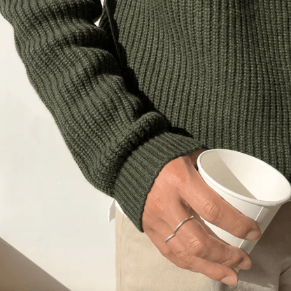 Forest green 100% cotton ribbed sweater for men, showcasing a relaxed silhouette and comfortable raglan shoulders.