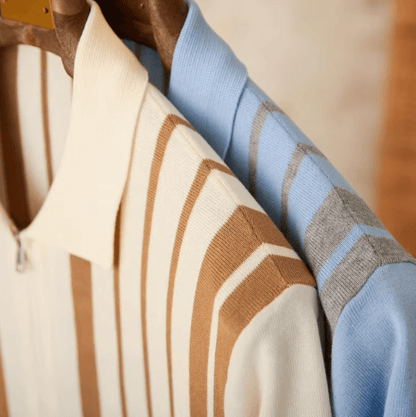 Men's light blue full-zip knitted cardigan featuring white striped trim on the collar and a short-sleeved polo design.