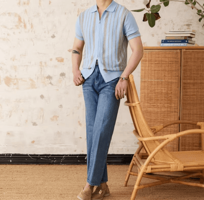 Men's light blue full-zip knitted cardigan featuring white striped trim on the collar and a short-sleeved polo design.