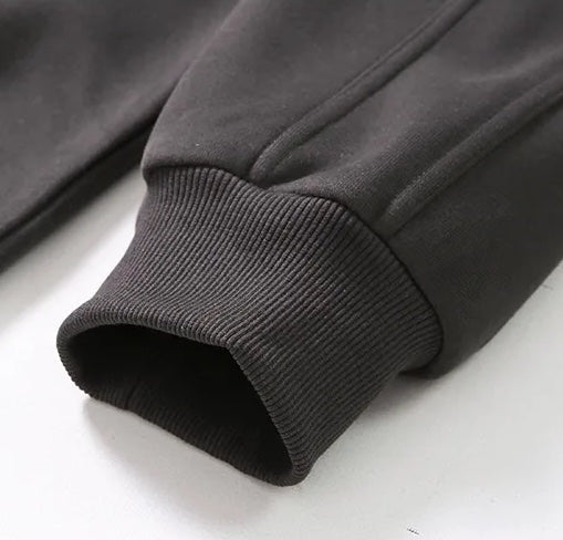 Close-up of the LORMIER 100% cotton textured weave, highlighting the 3D hybrid knit pattern and matte finish.