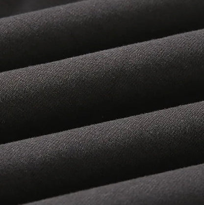 Close-up of the LORMIER 100% cotton textured weave, highlighting the 3D hybrid knit pattern and matte finish.
