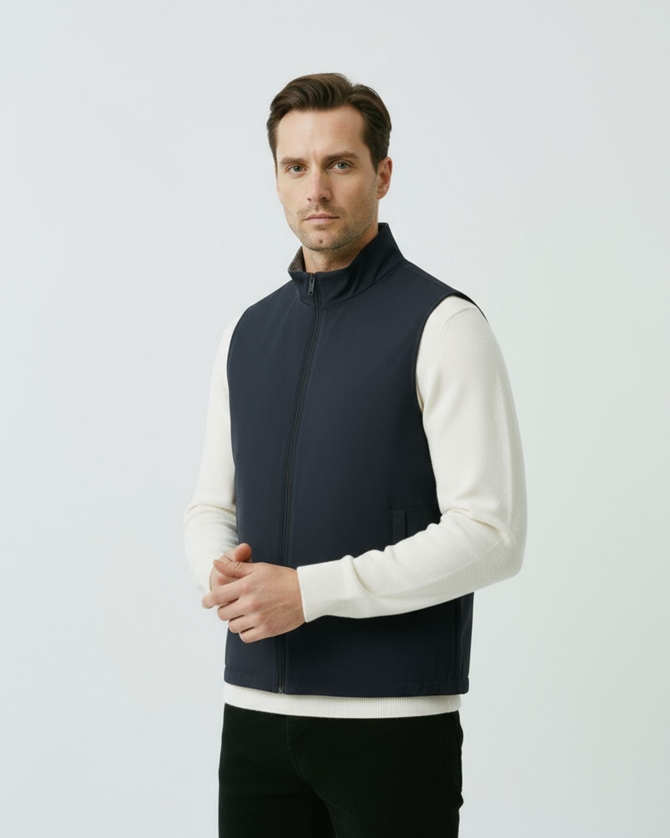 Deep navy blue reversible utility vest with a clean, technical finish and versatile dual-sided styling.