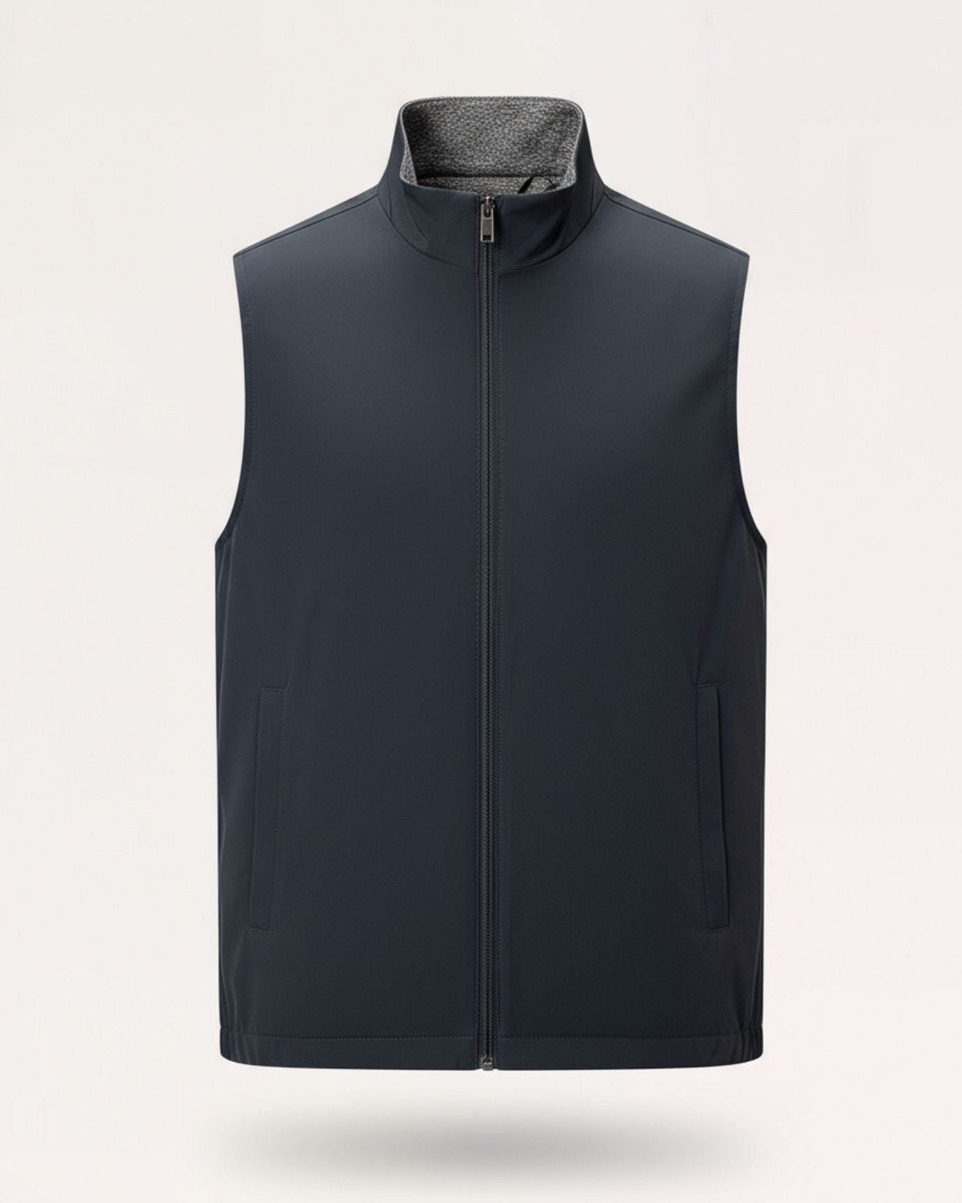 Deep navy blue reversible utility vest with a clean, technical finish and versatile dual-sided styling.