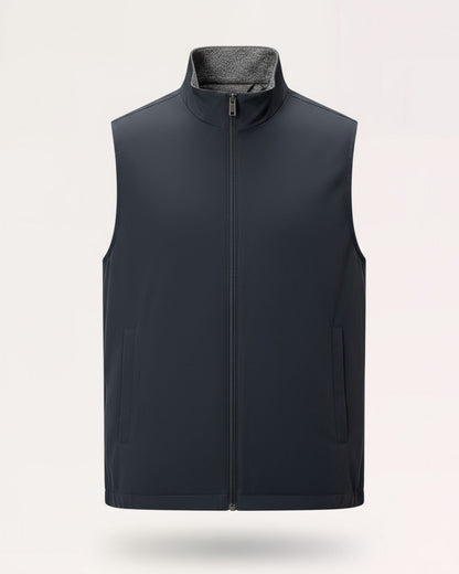 Deep navy blue reversible utility vest with a clean, technical finish and versatile dual-sided styling.