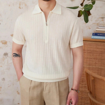 Men's crisp white ribbed half-zip polo crafted from a breathable linen blend with a modern metallic zipper detail.