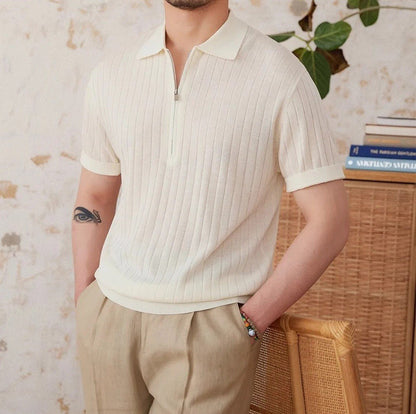 Men's crisp white ribbed half-zip polo crafted from a breathable linen blend with a modern metallic zipper detail.