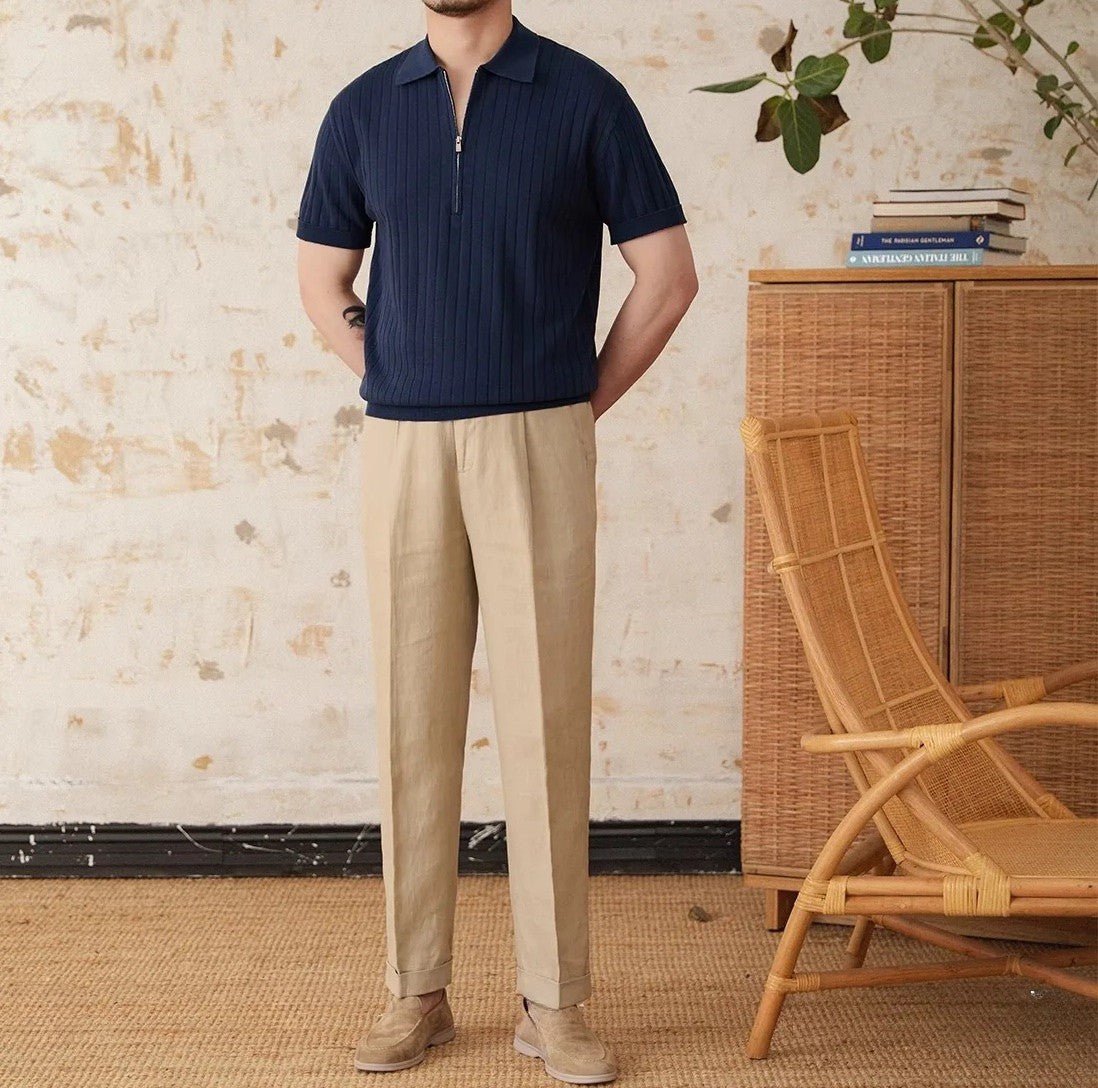 Men's navy blue ribbed half-zip polo crafted from a premium linen-blend with a modern metallic zipper.