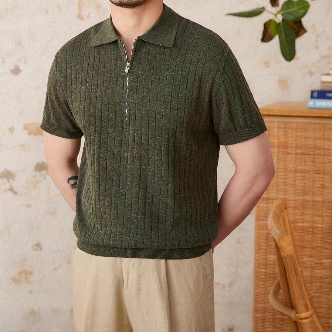 Men's khaki linen-blend half-zip polo featuring a sophisticated vertical ribbed texture and a tailored athletic fit.