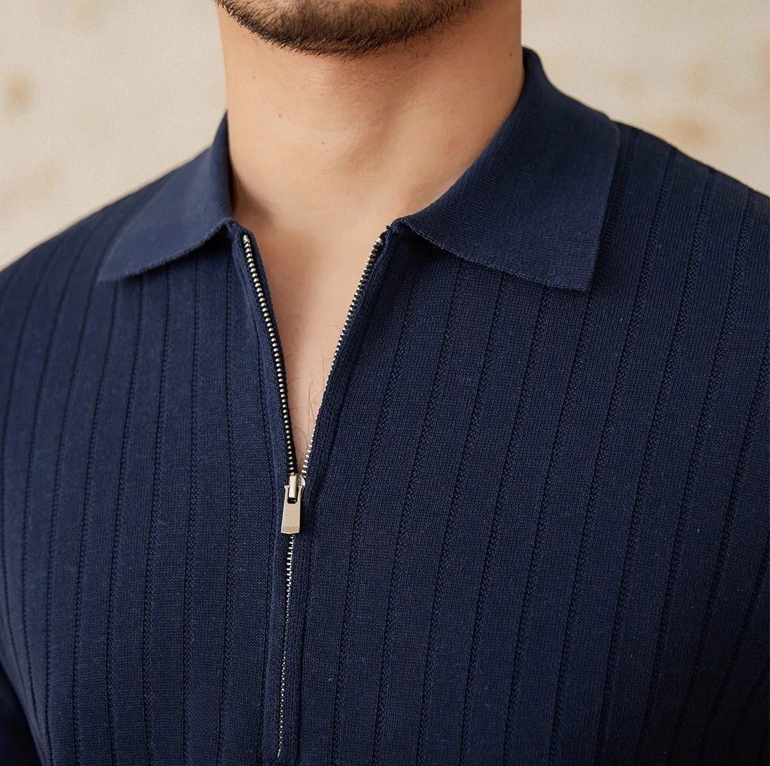 Men's navy blue ribbed half-zip polo crafted from a premium linen-blend with a modern metallic zipper.