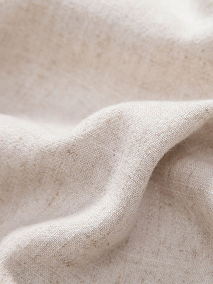 Close-up of beige fabric with a soft texture