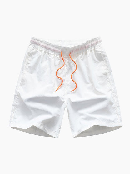 White shorts with orange drawstring on a white background