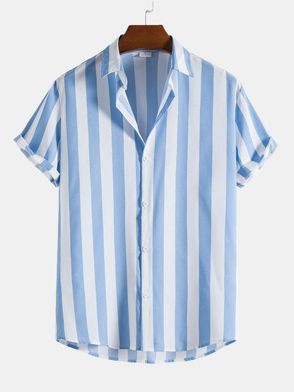 Blue and white striped shirt on a hanger against a light gray background