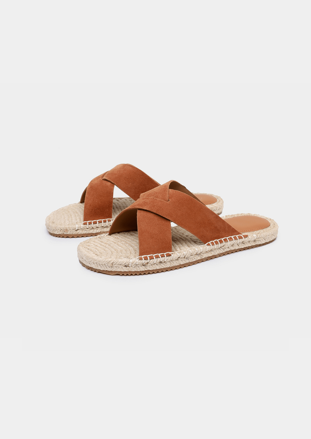 Vibrant orange suede open-toe sandals featuring a lightweight construction and braided jute trim.