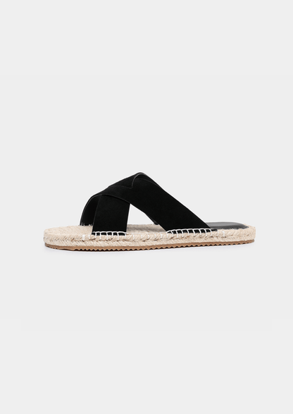 Minimalist black sheep suede sandals with a textured jute sole edge and comfortable everyday fit.