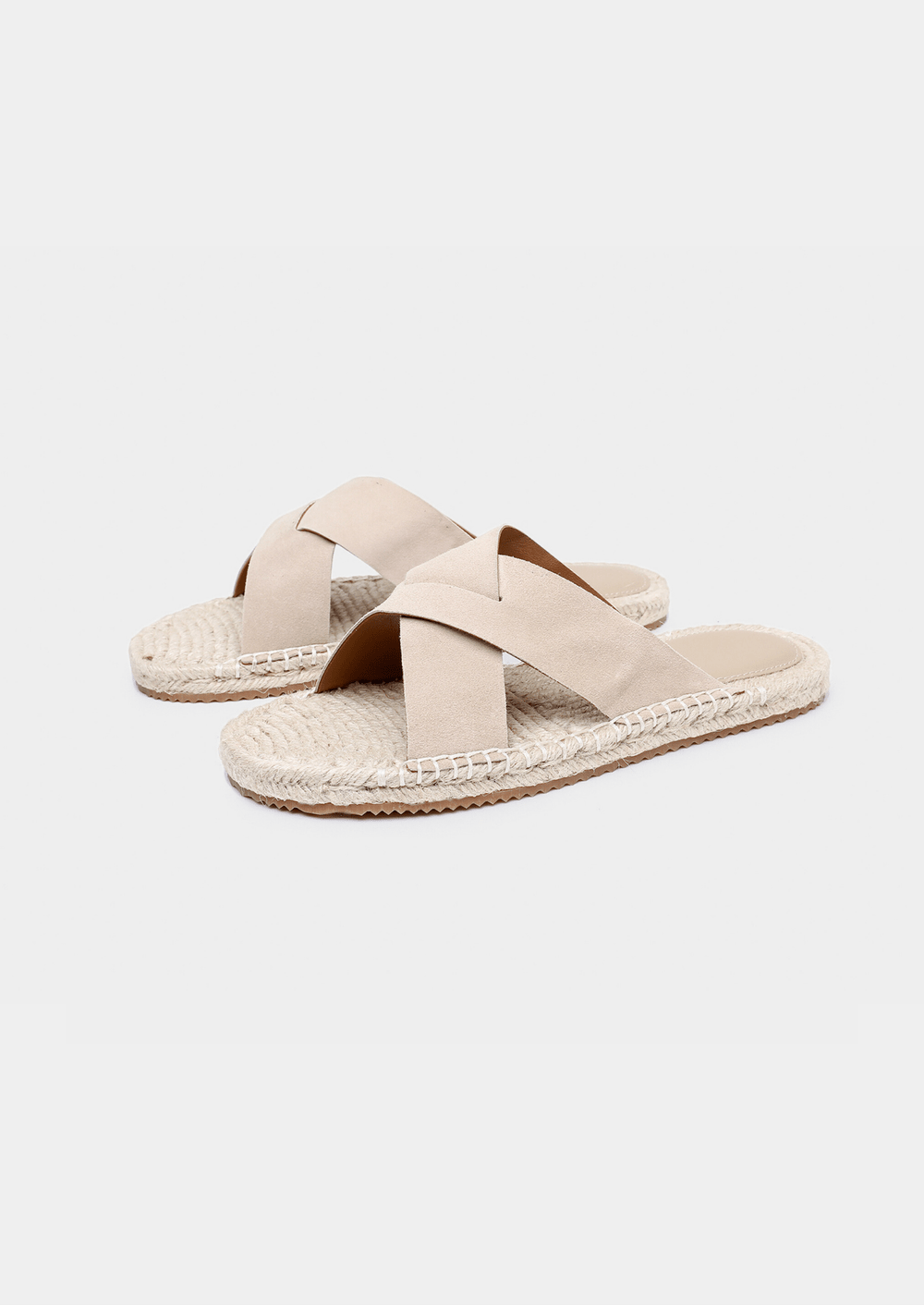 Men's beige sheep suede sandals featuring a braided jute trim and a modern open-toe silhouette.