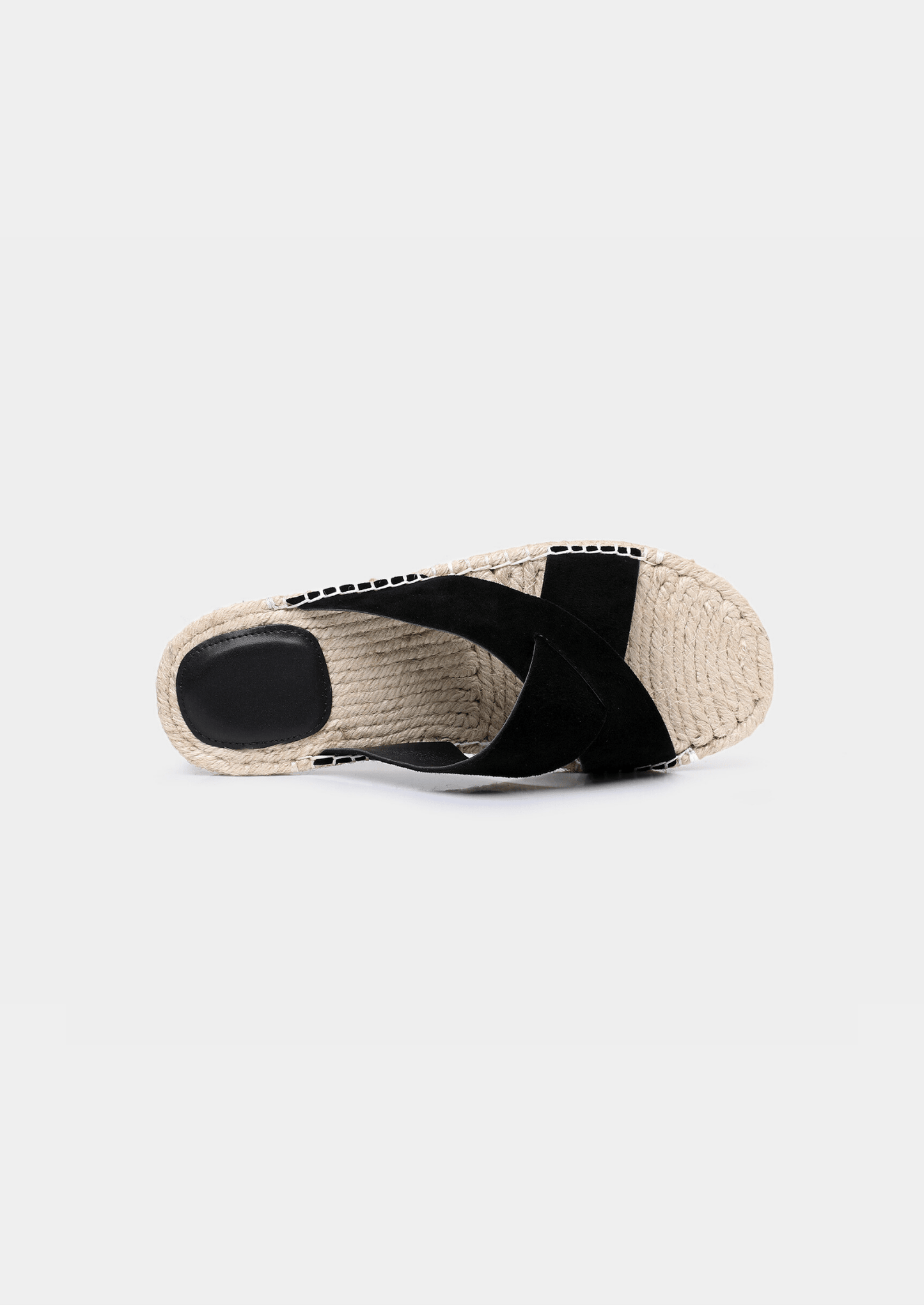 Minimalist black sheep suede sandals with a textured jute sole edge and comfortable everyday fit.