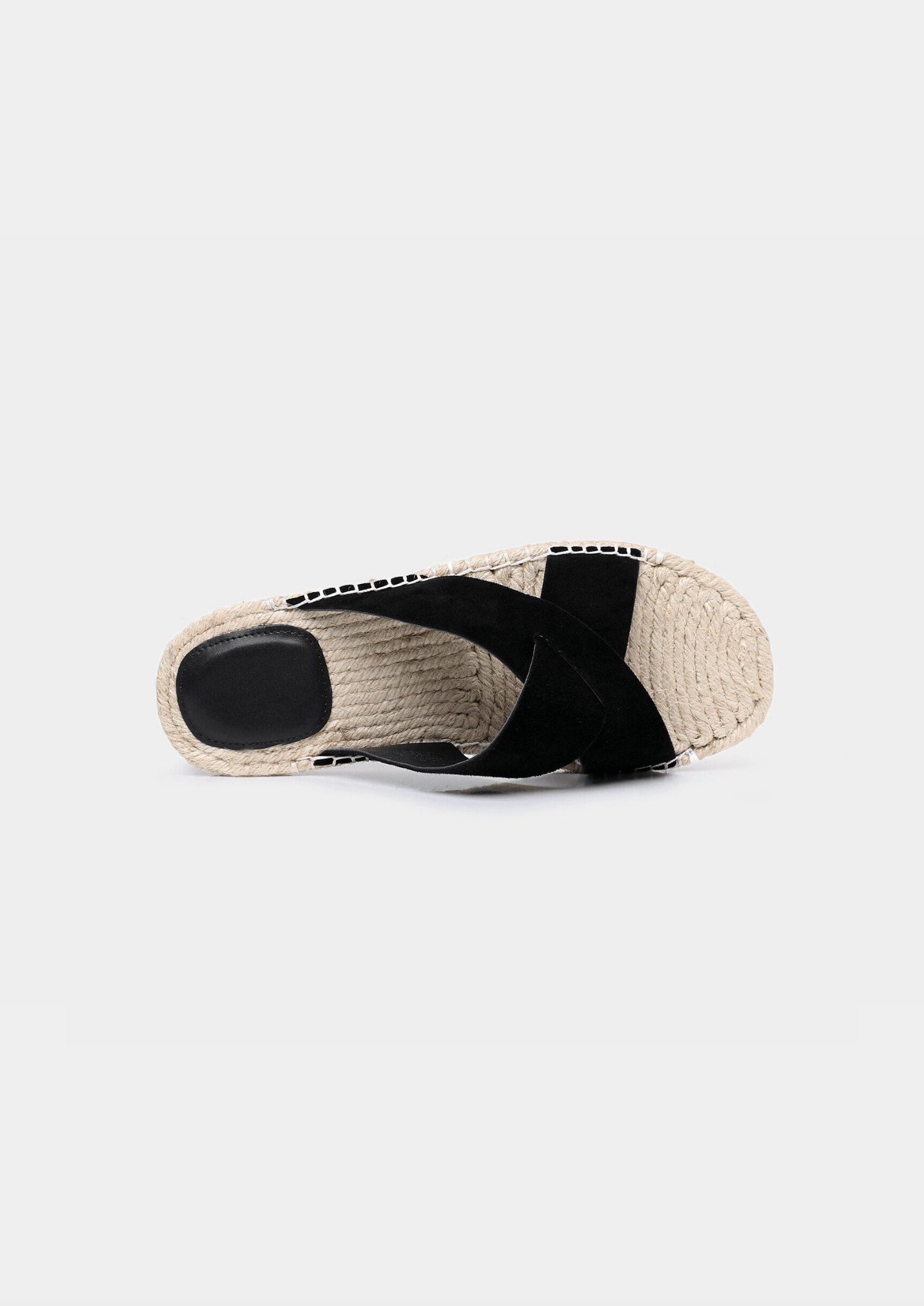 Minimalist black sheep suede sandals with a textured jute sole edge and comfortable everyday fit.