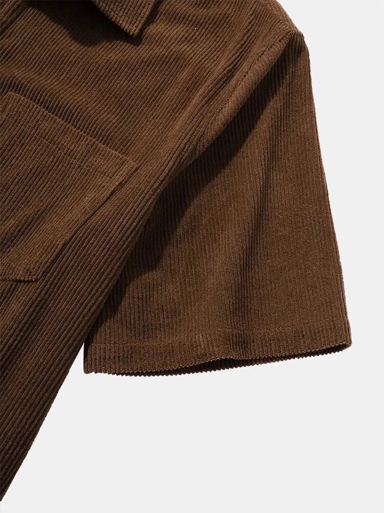 Close-up of LORMIER's coffee brown cotton corduroy shirt, highlighting the premium micro-cord texture and durable weave.