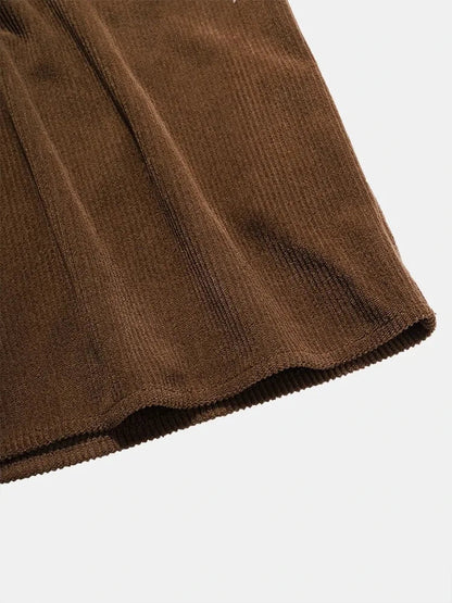 Close-up of LORMIER's coffee brown cotton corduroy shirt, highlighting the premium micro-cord texture and durable weave.
