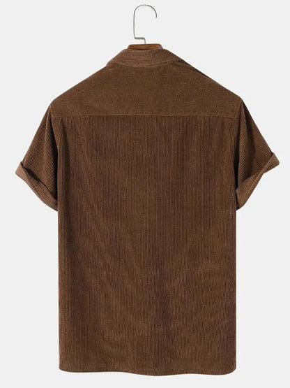 Men's brown short sleeve cotton corduroy shirt featuring a fine vertical rib texture and a comfortable, cool summer fit.