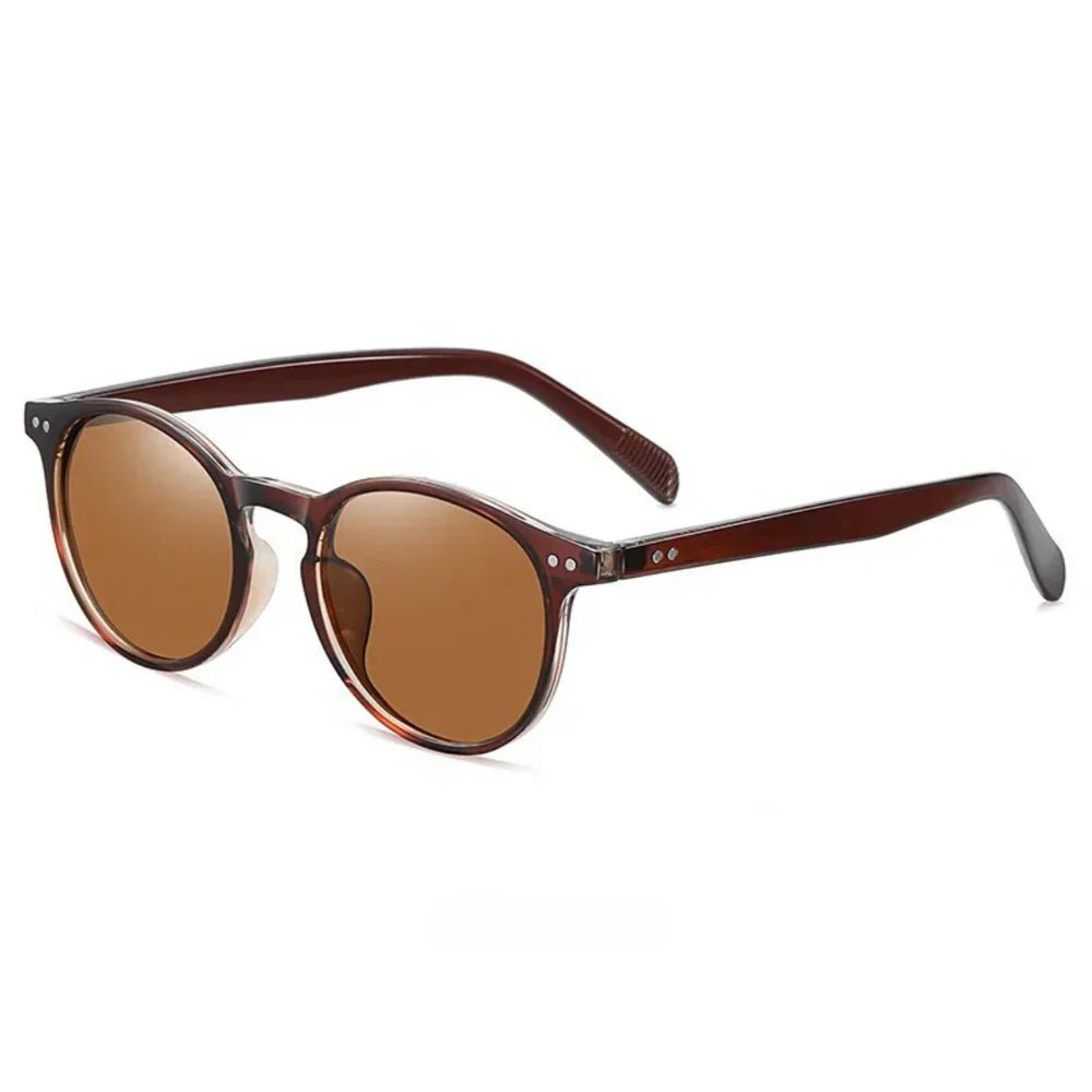 Brown sunglasses with round lenses on a white background