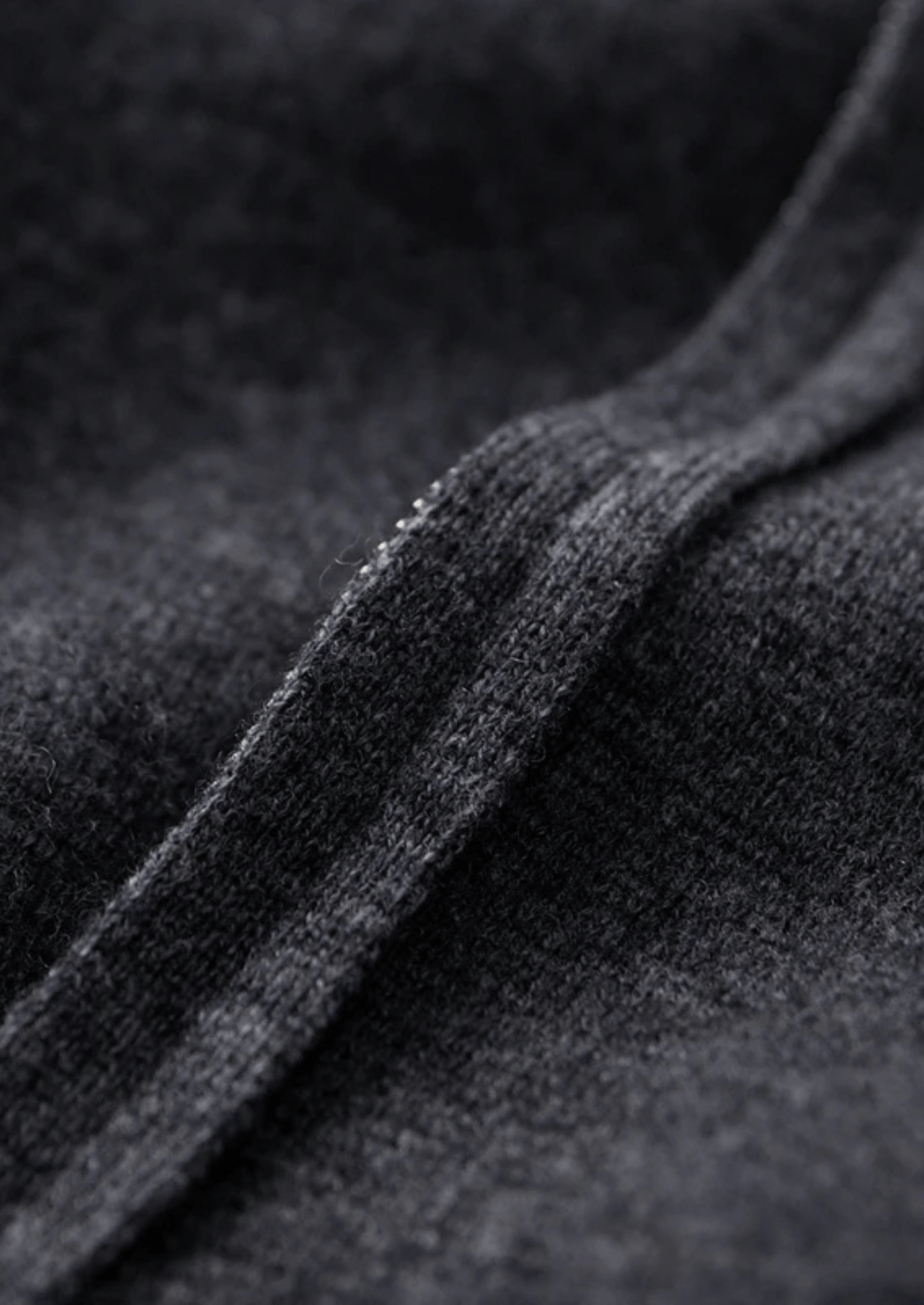 Close-up of dark gray fabric texture