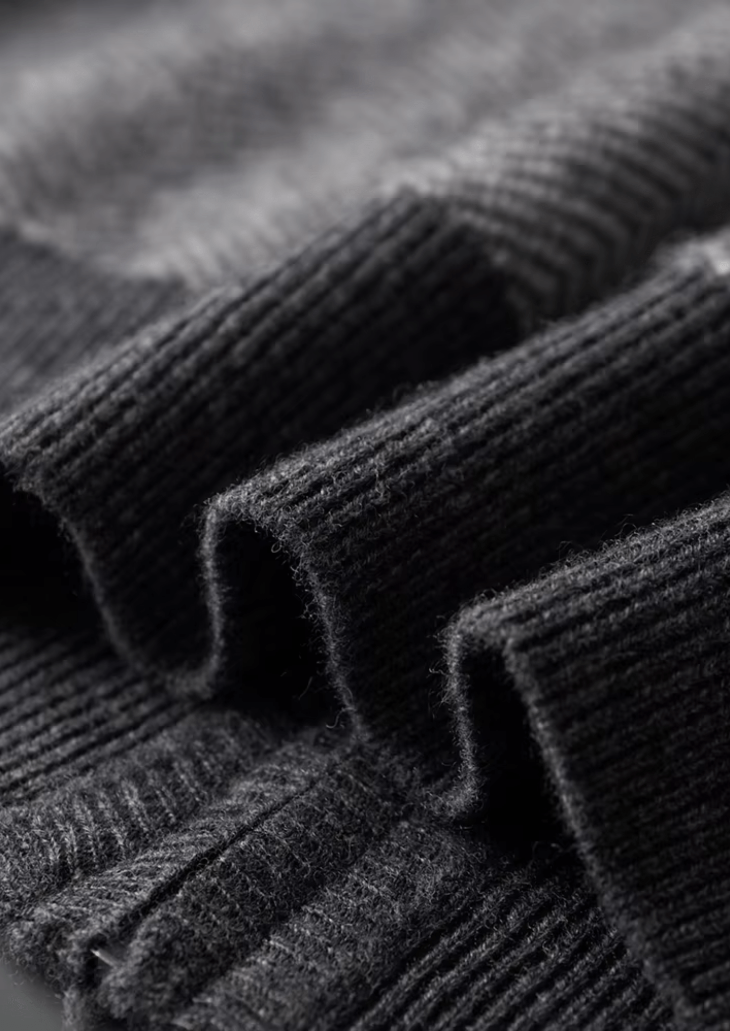 Close-up of ribbed knit fabric in gray color