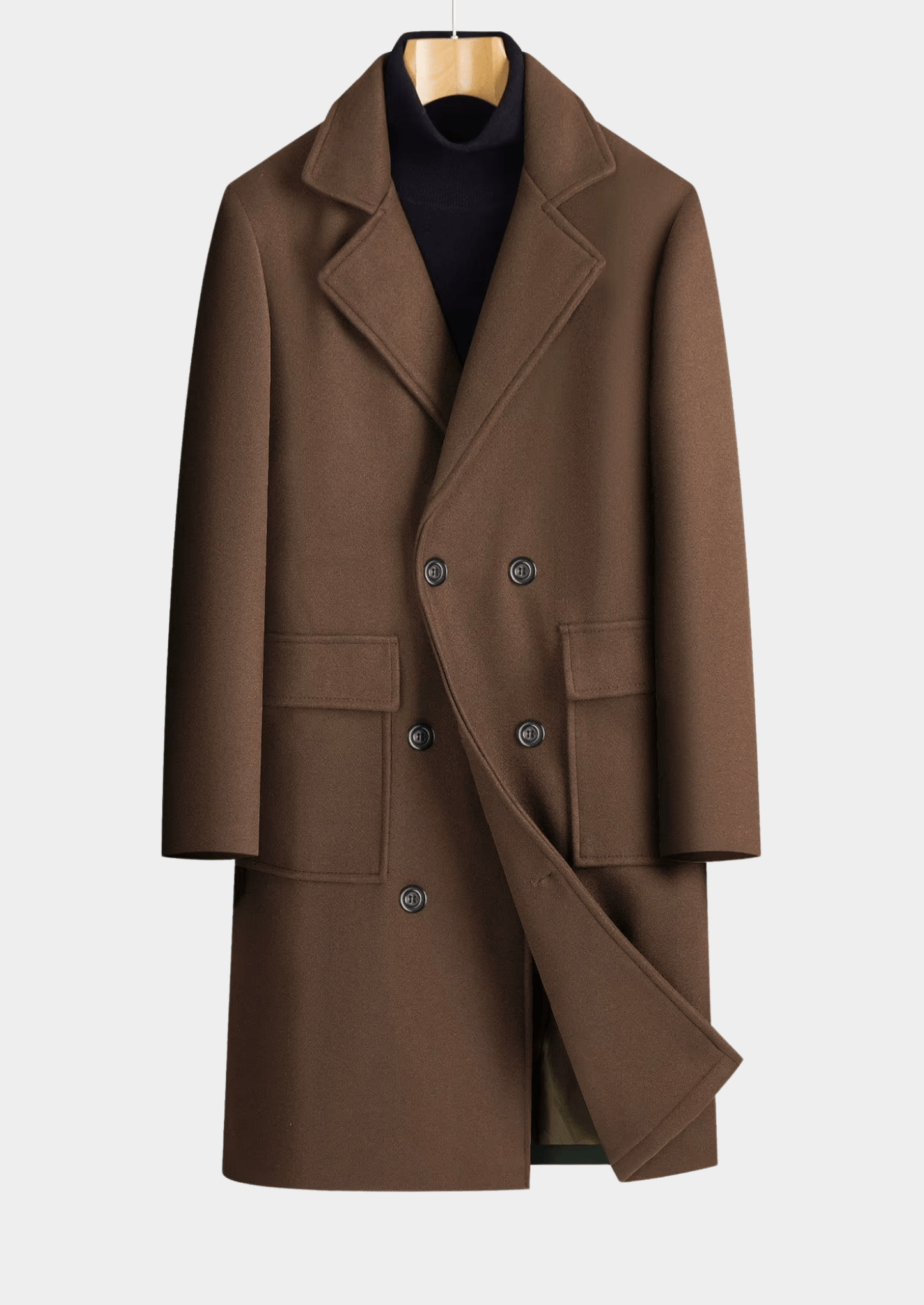 Brown coat on a hanger against a white background