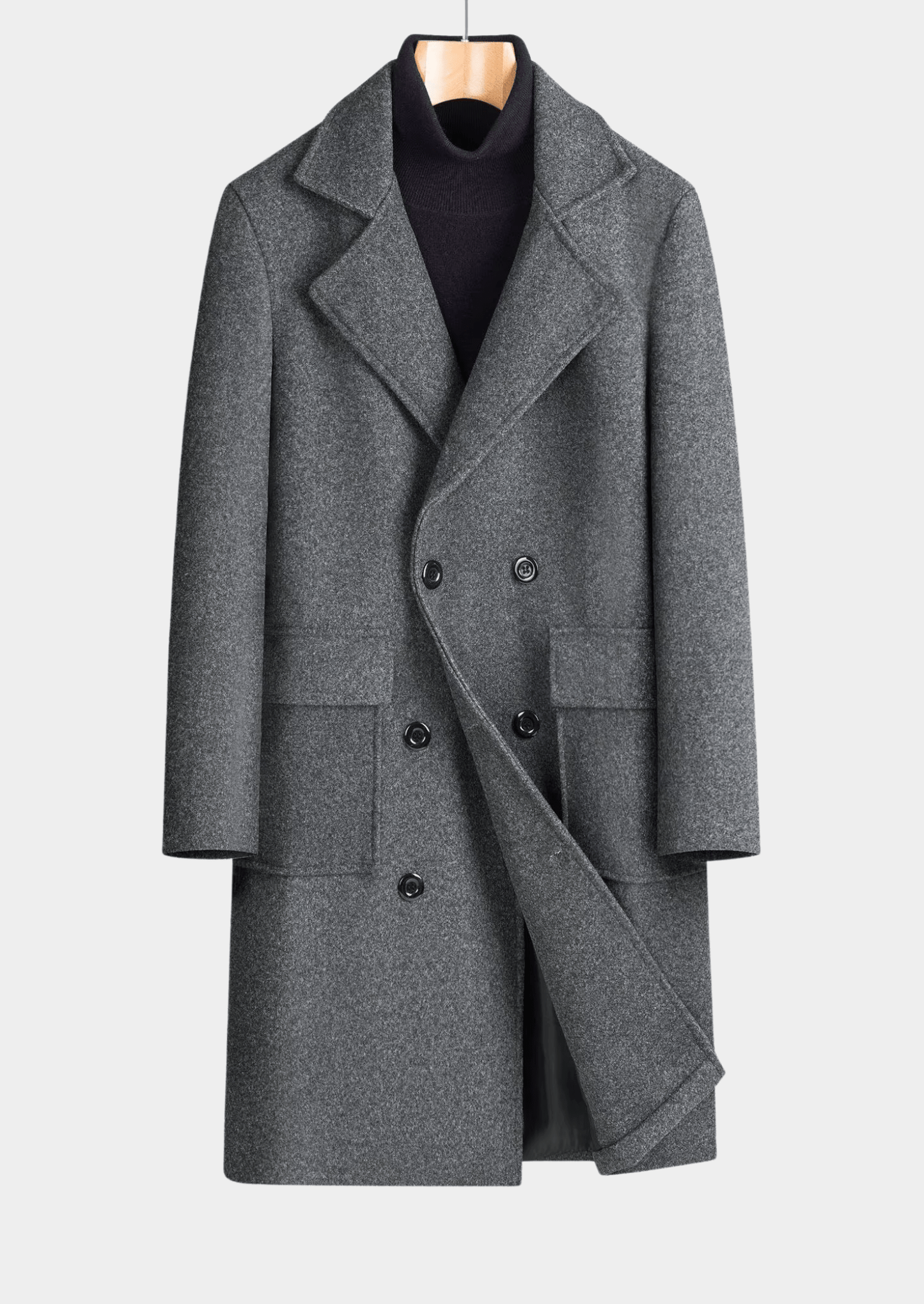 Gray coat on a hanger against a light gray background